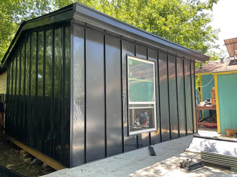 Black standing seam metal wall panels for Roof Inspection in Coachella